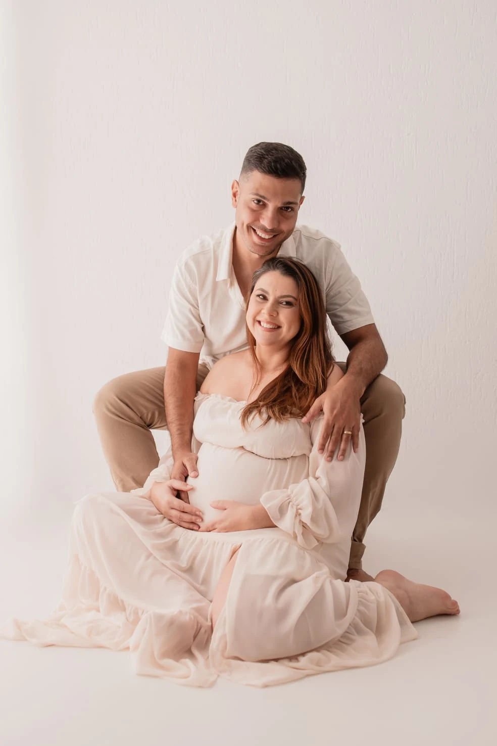 Victor e Luana sorrindo para a câmera